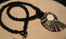 VINTAGE NAUTILUS SHELL  on 9" Black Seed Bead Necklace