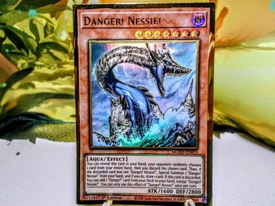 Danger! Nessie! premium gold rare Yu-Gi-Oh Maximum Gold: El Dorado trading card 