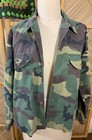 Vintage 1980s USA-made green and brown camouflage ranger shirt with button front and two chest flap pockets.