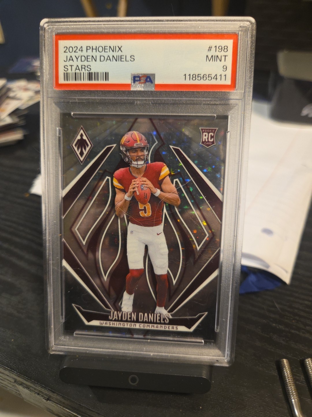 2024 Panini Phoenix - Rookies Jayden Daniels #198 Stars /180 (RC)