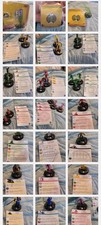 52 collectible HeroClix miniatures and their associated character cards