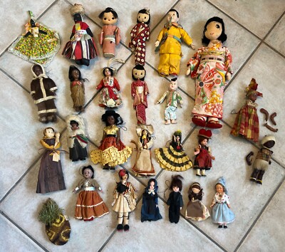 DOLLS - TWENTY-FIVE (25) - OF MANY COUNTRIES, AGES NOT KNOWN, BUT APPEAR OLDER