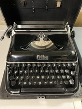 Máquina de escribir Erika modelo 10 - negra - mecánica - QWERTZ - maleta vintage