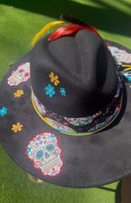Western black felt fedora, custom burned and painted design, feather trim