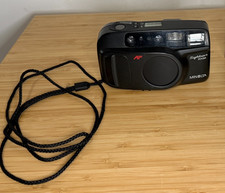 Vintage Minolta Sightseer Zoom AF 35mm Point Shoot Camera Powers On READ