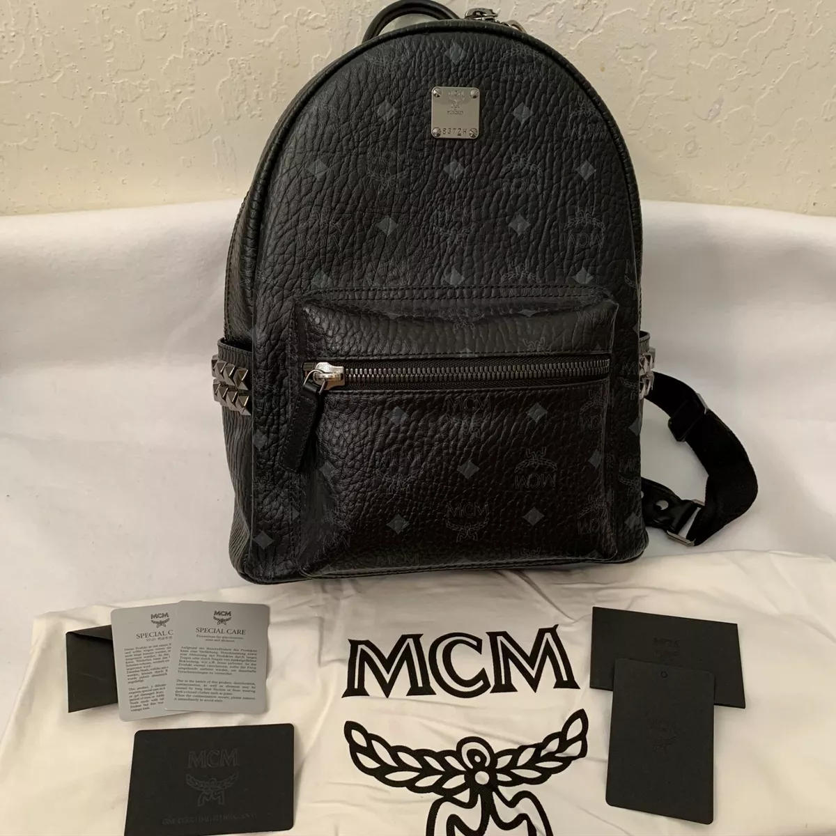 small black mcm bag