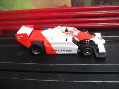 NEW Tyco TCR  F1 Indy Jam car 500 narrow working  Slotless Chassis  Hard to find