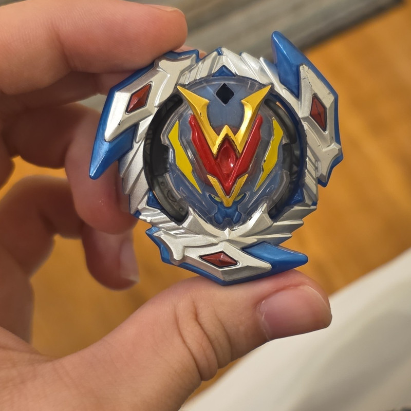 TOMY Beyblade Burst Spinning Top w/ Parts Ring & Tip, Blue/Silver, 2021
