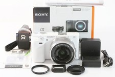 [only 56 Clicks, Boxed] Sony Alpha a6000 Mirrorless White Camera + 32GB SD B981