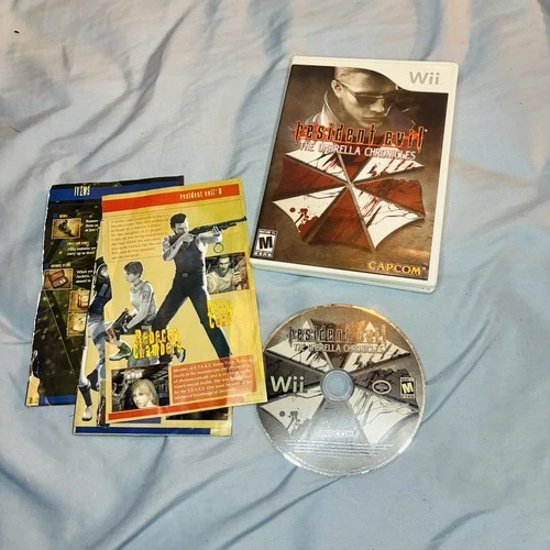 Resident Evil The Umbrella Chronicles Nintendo Wii Manual Is Torn Missing Pages