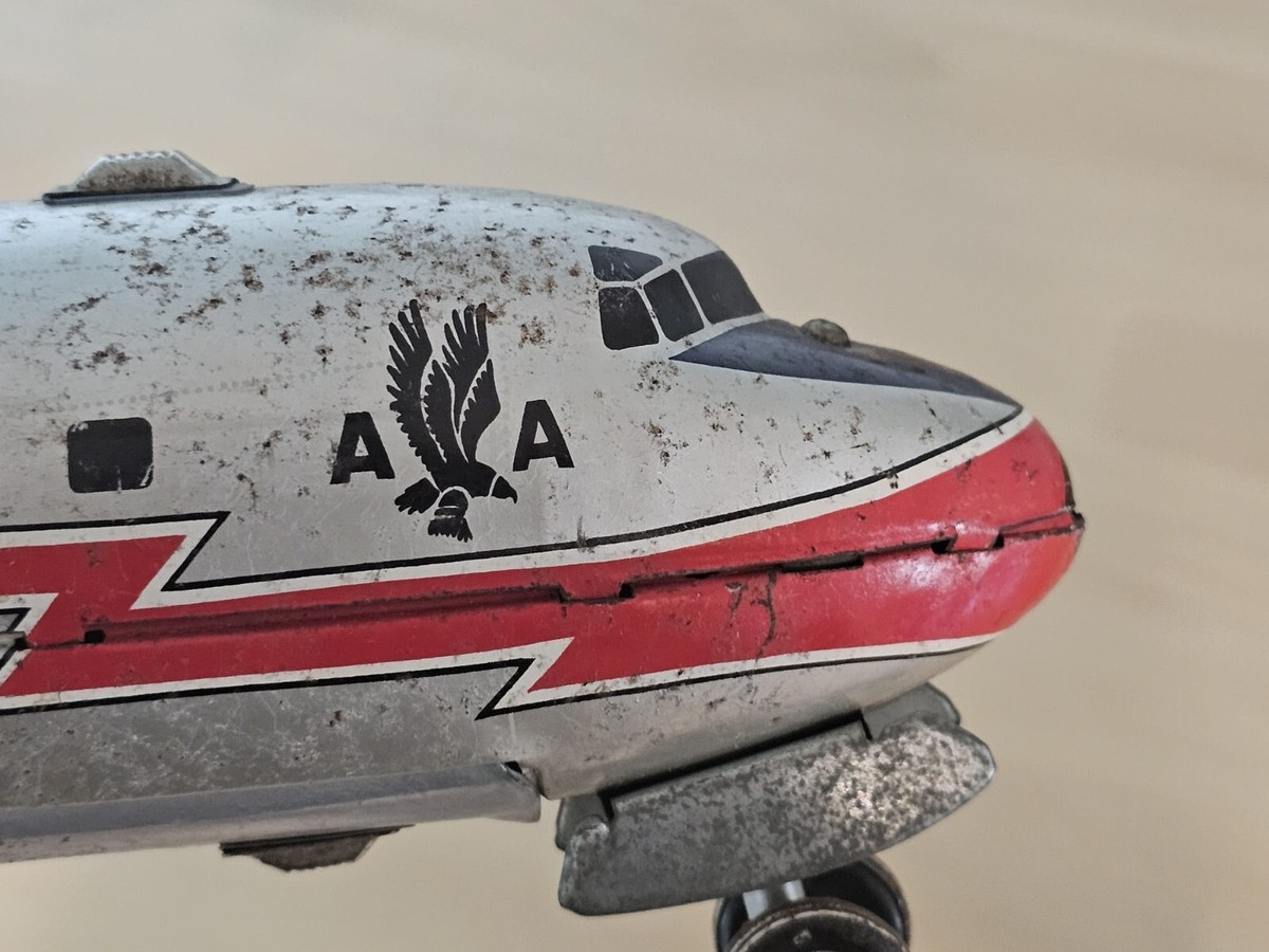 Cragstan Battery Operated American Airlines DC 7 Plane TOY LINE