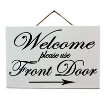 Bienvenido Por favor use letrero de puerta delantera flecha direccional lado trasero otra entrada
