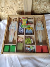 Melissa  Doug Classic Magnetic Wooden Dress-Up Dolls In Wooden Case