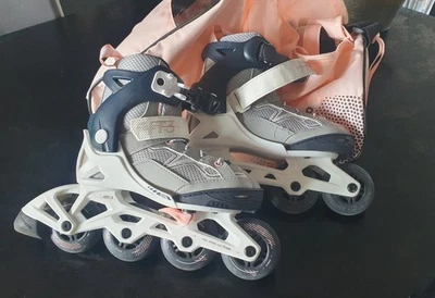 Paire de Rollers fille Oxelo Abec 3 t.29-32 et protections - Photo 1/4