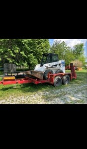 Bobcat 763 Wheeled Compact Skid Steer Loader w/ Bucket and Forks.