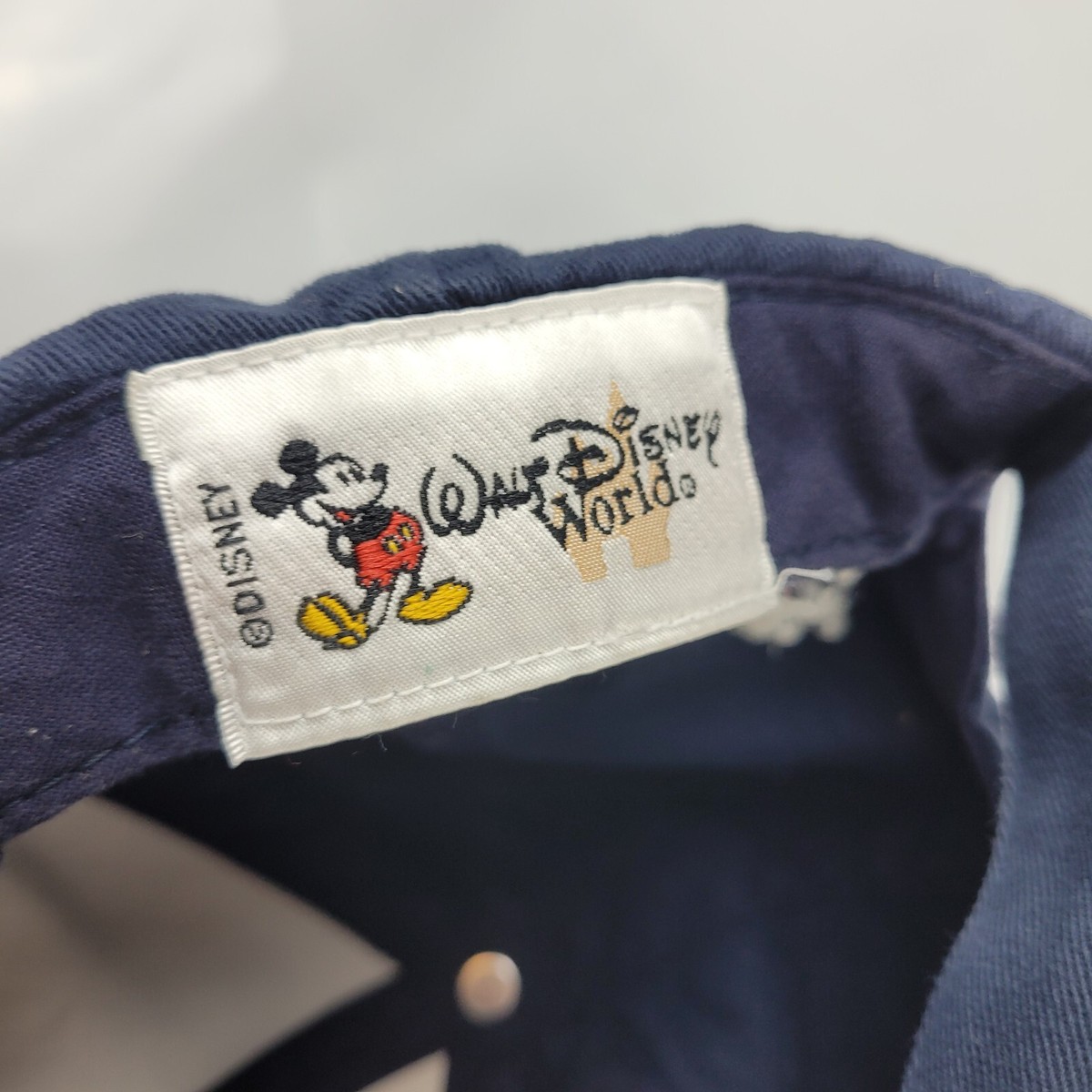 Walt Disney World Evolution Of Mickey Adjustable Hook And Closure