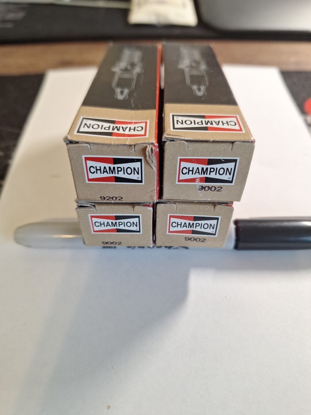 Pack Of 4 Genuine Champion Iridium Spark Plugs.  RC12WMPB4 9002