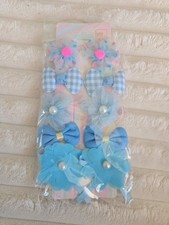 Set of 10 blue bow and flower hair clips