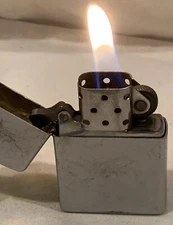 Zippo Lighter Tested And Works.