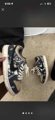 Nike Dunk Low Travis Scott black and beige sneakers with white bandana print