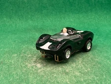 ORIGINAL AURORA T-JET # 1431, LIGHTED MCLAREN ELVA, BLACK/WHITE, CHROME WHEELS