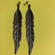 Brass colored 5 inch long drop pierced earrings feather shaped