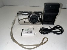 Samsung PL120 14.2MP Digital Camera Silver. A few flaws, still fully functional.