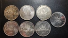LOT OF SEVEN 80% CANADIAN SILVER DOLLAR.  MIX OF UNC AND PROOF