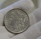 1890 O US Morgan Silver Dollar $1 XF (Cleaned, Retoned)