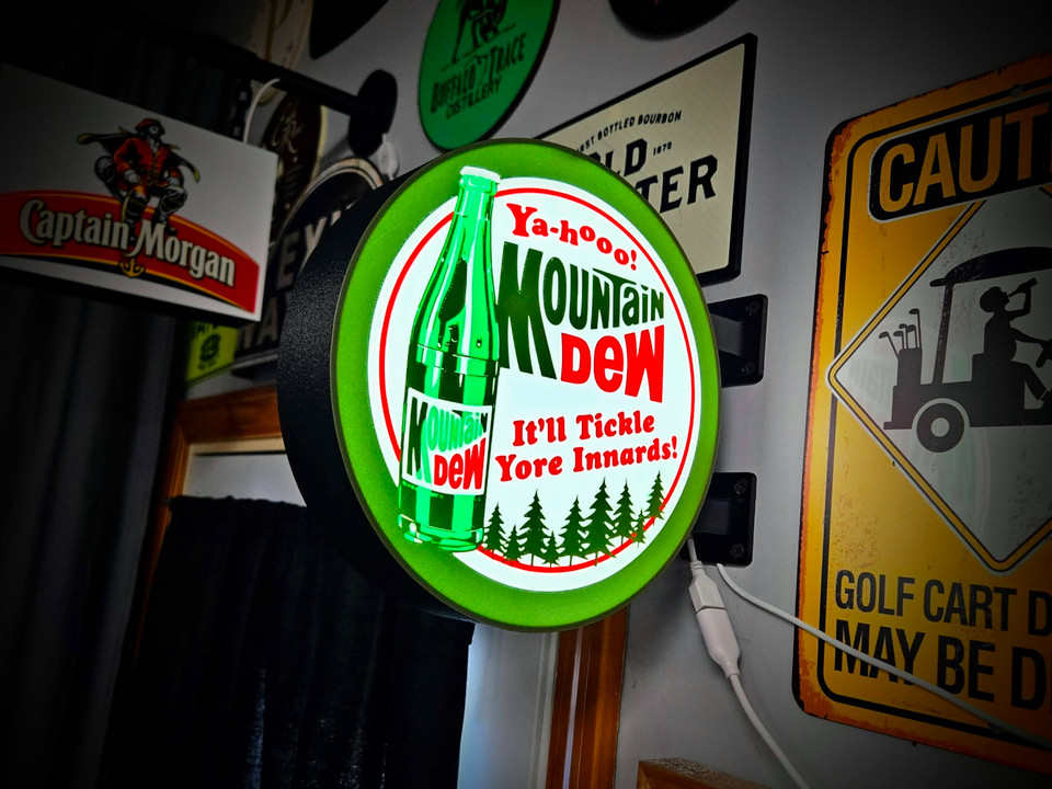 3D-printed Mountain Dew LED lightbox sign hits the sweet spot between nostalgic soda branding and modern maker culture — glows great in a dark man cave.