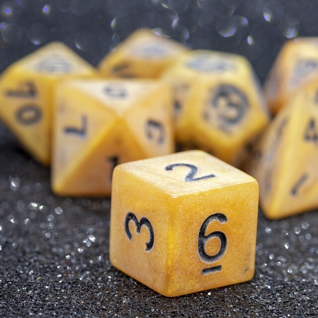 Sage's Ancient Golden Stone Black Ink Acrylic Polyhedral Dice Set