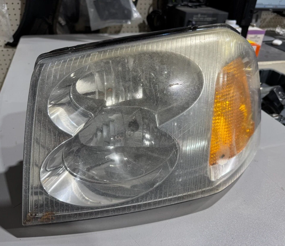Faro delantero izquierdo GMC ENVOY 2002-2009 P/N 40310748 ORIGINAL OEM PIEZA USADA Foto 2 de 4