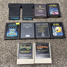 Atari 2600 System Bundle with Console, 30 Games, Joystick, Paddles, and More LOT