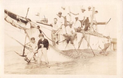 CREW OF A WHALING SHIP POSE WITH A DEAD WHALE, REAL PHOTO PC ~ used 1930s