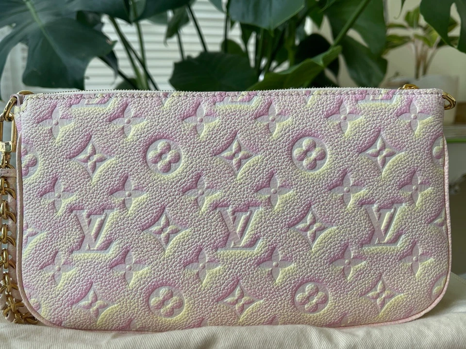 Louis Vuitton Empreinte Cuero Multi Pochette, StarDust (Rosa y Amarillo) Foto 3 de 4