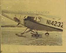 1981 Press Photo Airplane on skis lands on ice near Anchorage, Alaska