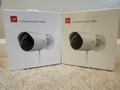 2 pack  YI Outdoor Security Camera, 1080p Waterproof Night Surveillance - NEW