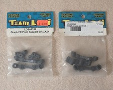Vintage Team Losi ~ XXX4 ~ 2 Item Parts Lot ~ Graphite Front & Rear Pivot Set