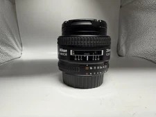 Nikon AF Nikkor 28mm 1:2.8 D Camera Lens with one cap. Works