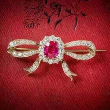 2Ct Oval Cut Lab-Created Pink Ruby Ribbon Bow Brooch Pin 14K Yellow Gold Plated