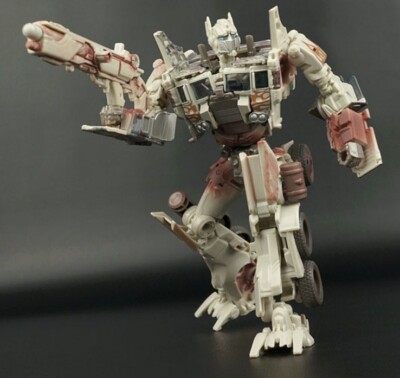 transformers age of extinction Optimus Prime Rusty vers Takara Tomy Evasion Mode