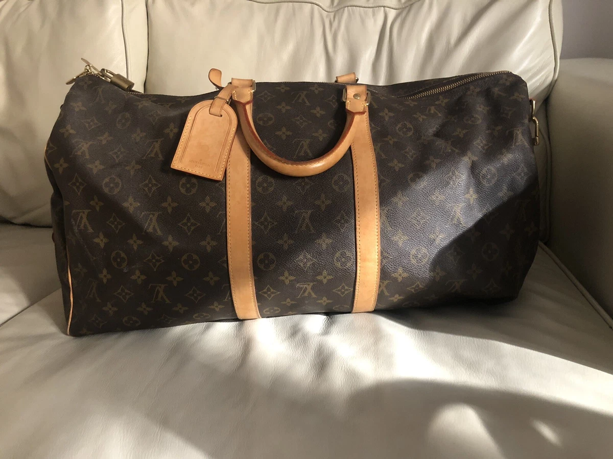 LOUIS VUITTON KEEPALL 55 TRAVEL BAG with shoulder strap. Monogram Printing