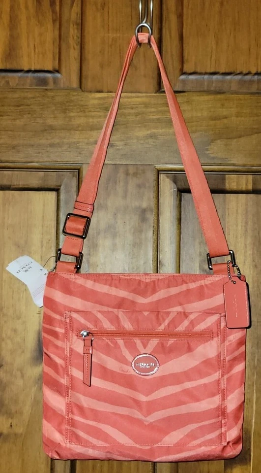 Bolso Bandolera Coach Devin Patrón Cebra Escapada Nylon Archivo F77541 Nuevo con Etiquetas Naranja Caliente