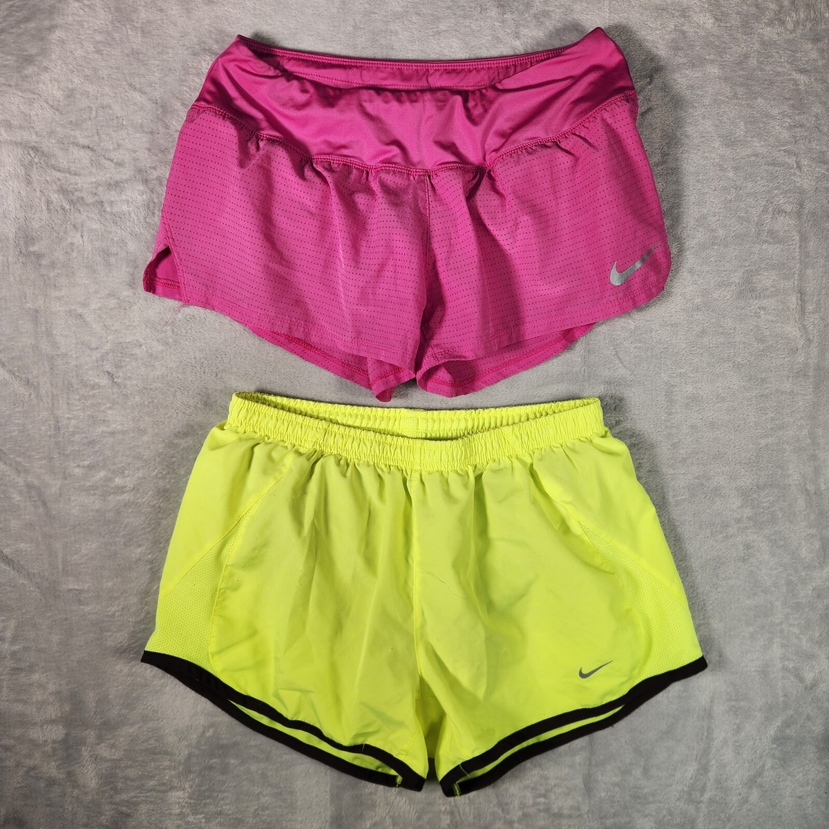 green and pink nike shorts