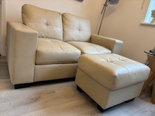faux leather sofa and footstool
