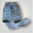 Light blue high-rise vintage Lee jeans size 8 with faded front thighs, five-pocket design, and visible “Made in USA” label.