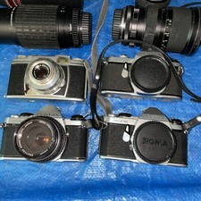 4 35 MM Camera W/ 3 Additional Lenses AC 
