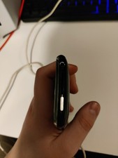 Apple iPhone 3GS 8GB IOS it is missing a SIM card slot.