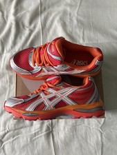 ASICS Baskets femme running tige basse lacets uni orange rouge argent blanc