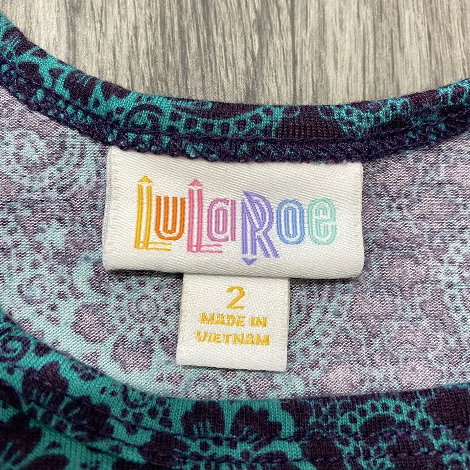 Vestido Camiseta Floral Verde y Púrpura LULAROE Cuello Redondo Mangas 3/4 Niña Talla 2 Foto 4 de 4